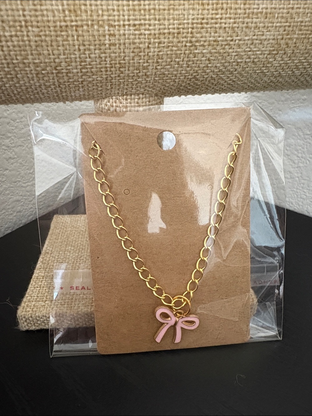 Handcrafted bow charm necklace